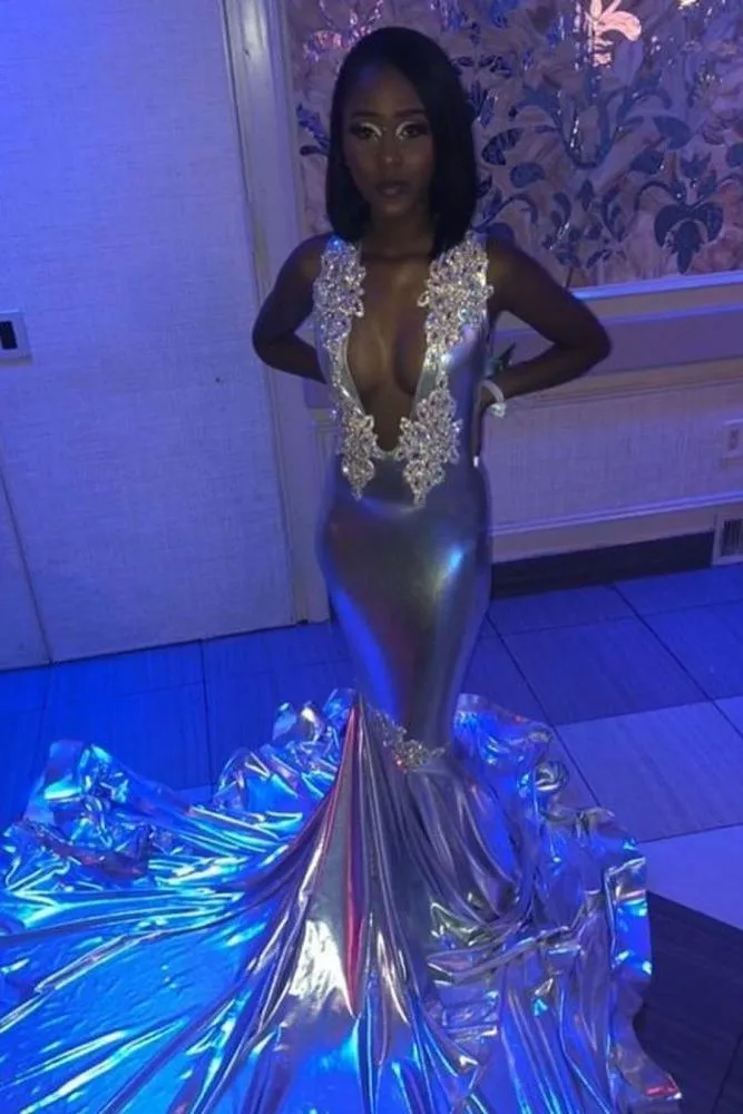 Deep V-neck Sleeveless Appliques Court Train Mermaid Prom Dresses