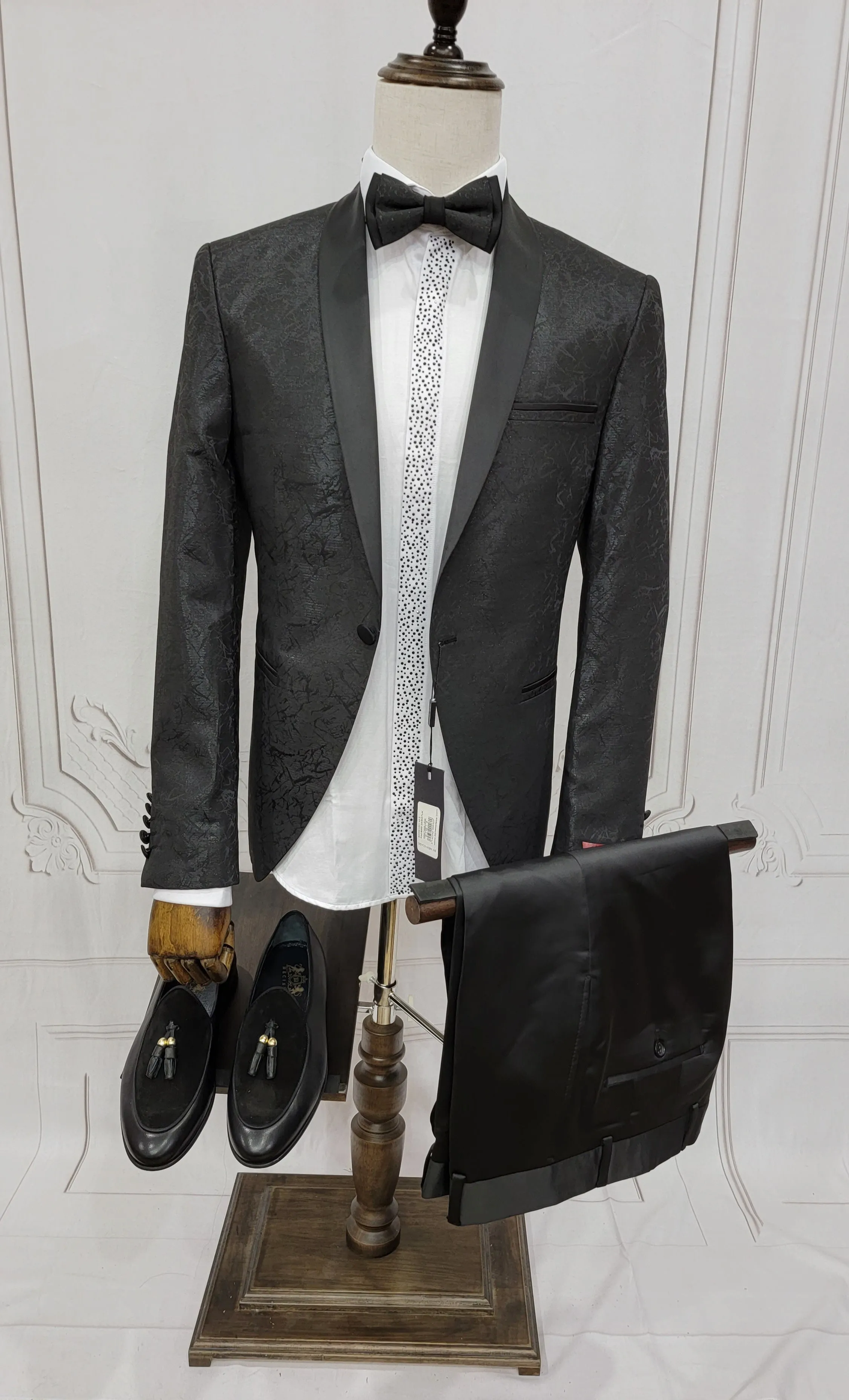 Single Button Two-Piece Tuxedo Suit with matching bow tie and Black Pants.
