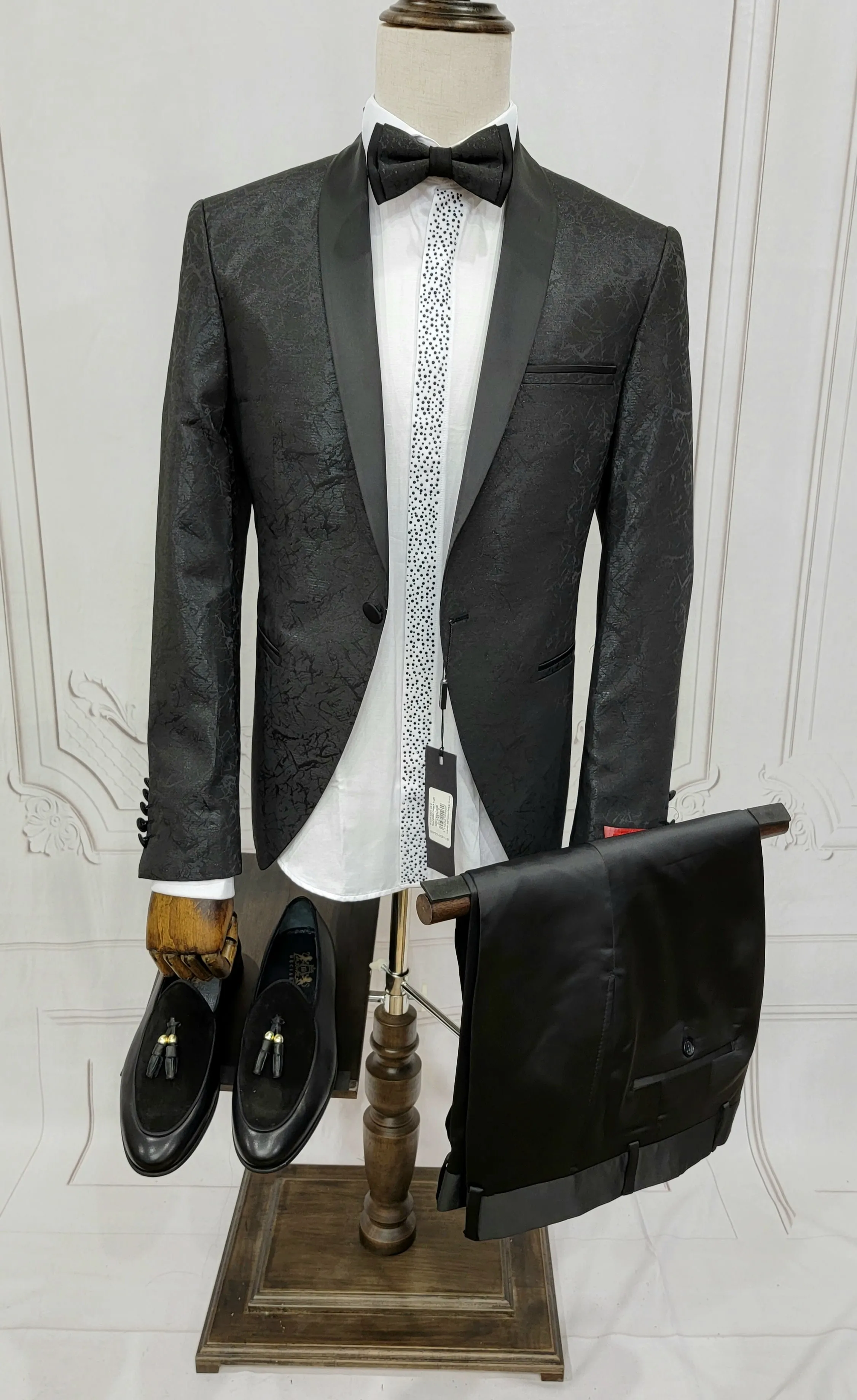 Single Button Two-Piece Tuxedo Suit with matching bow tie and Black Pants.