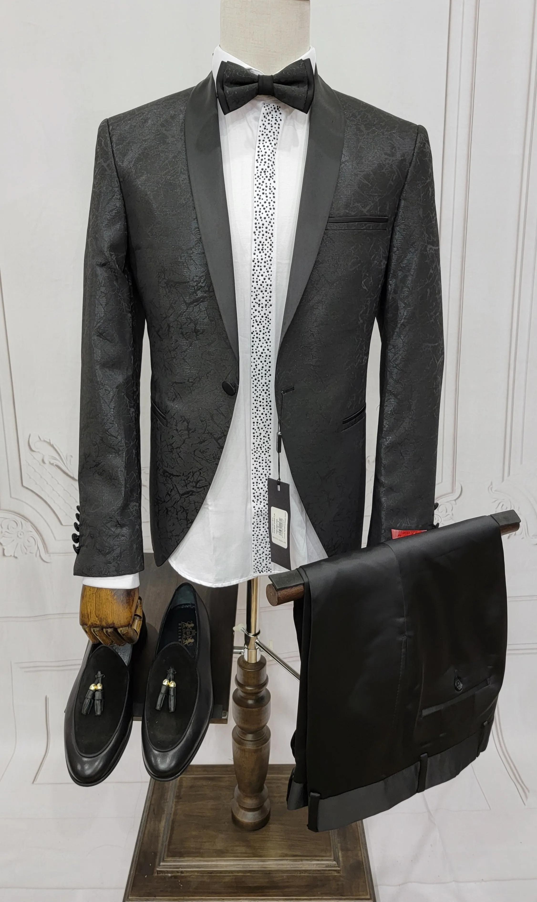 Single Button Two-Piece Tuxedo Suit with matching bow tie and Black Pants.