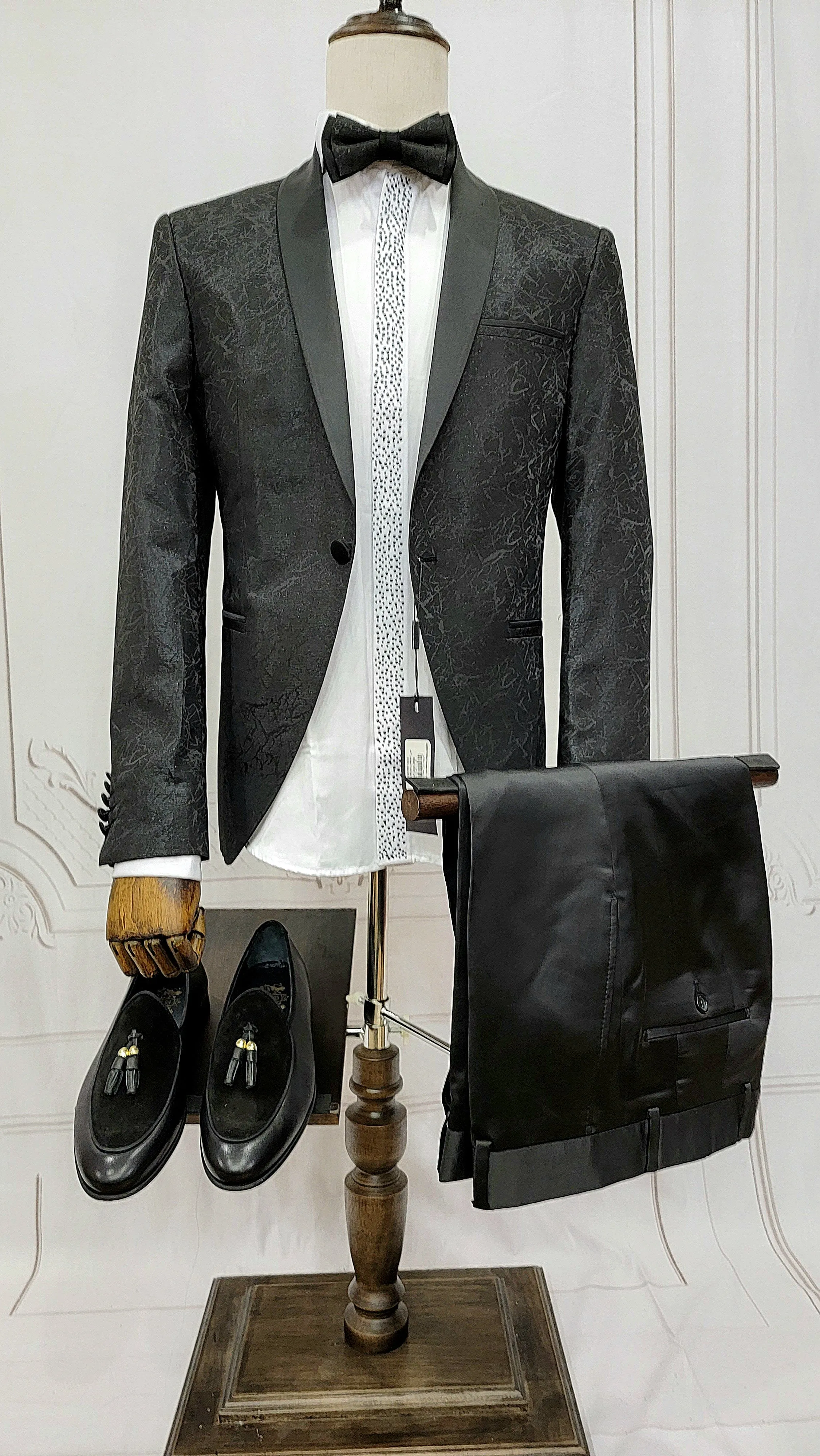 Single Button Two-Piece Tuxedo Suit with matching bow tie and Black Pants.