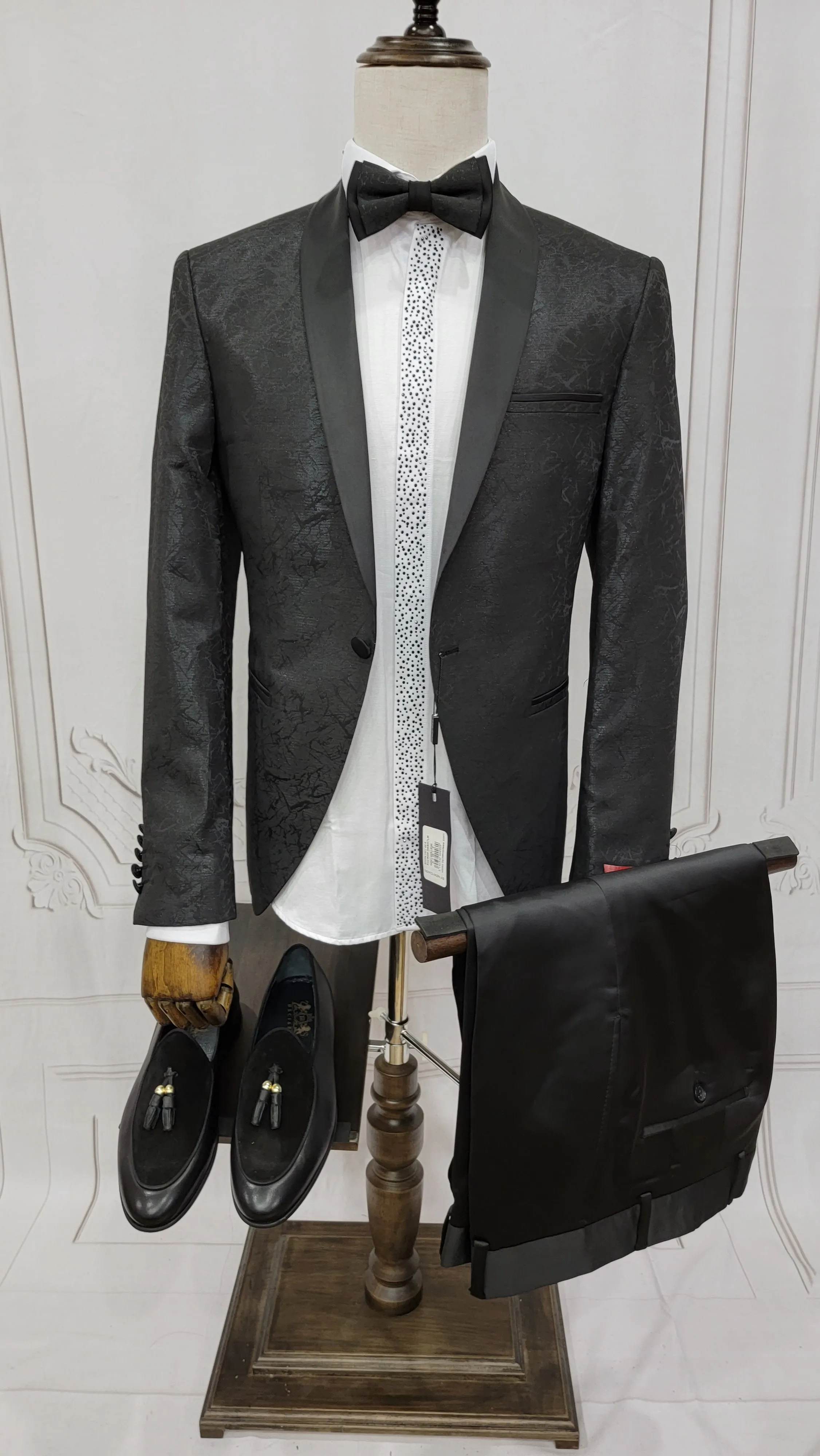 Single Button Two-Piece Tuxedo Suit with matching bow tie and Black Pants.