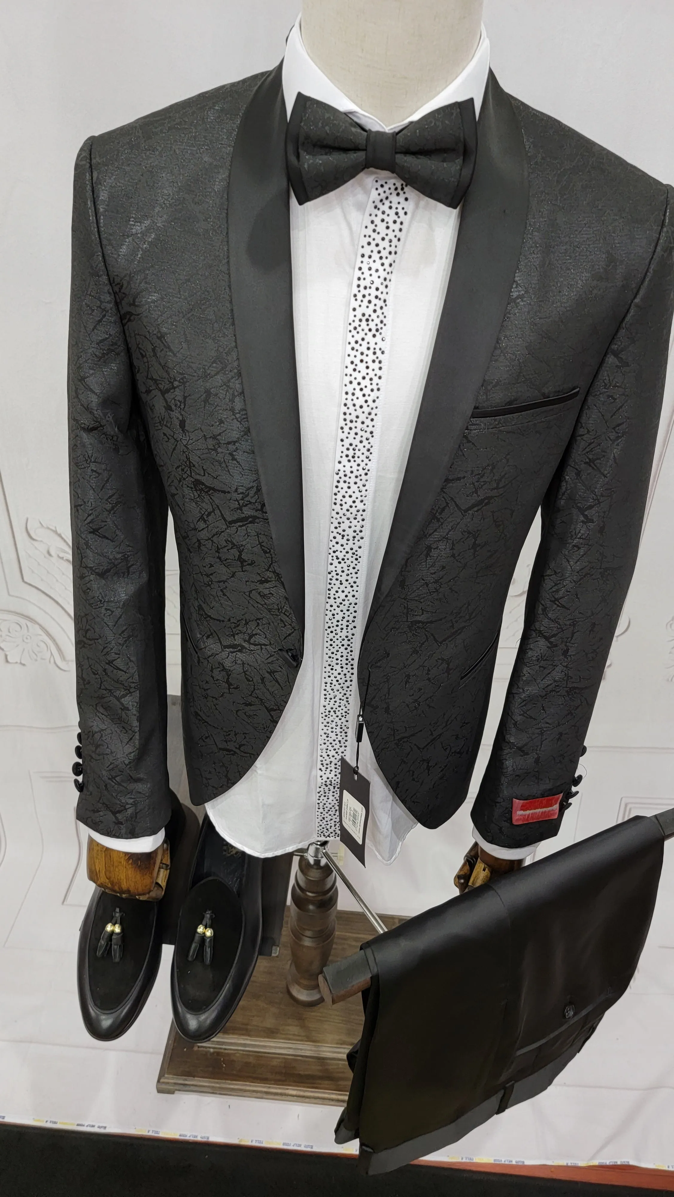 Single Button Two-Piece Tuxedo Suit with matching bow tie and Black Pants.