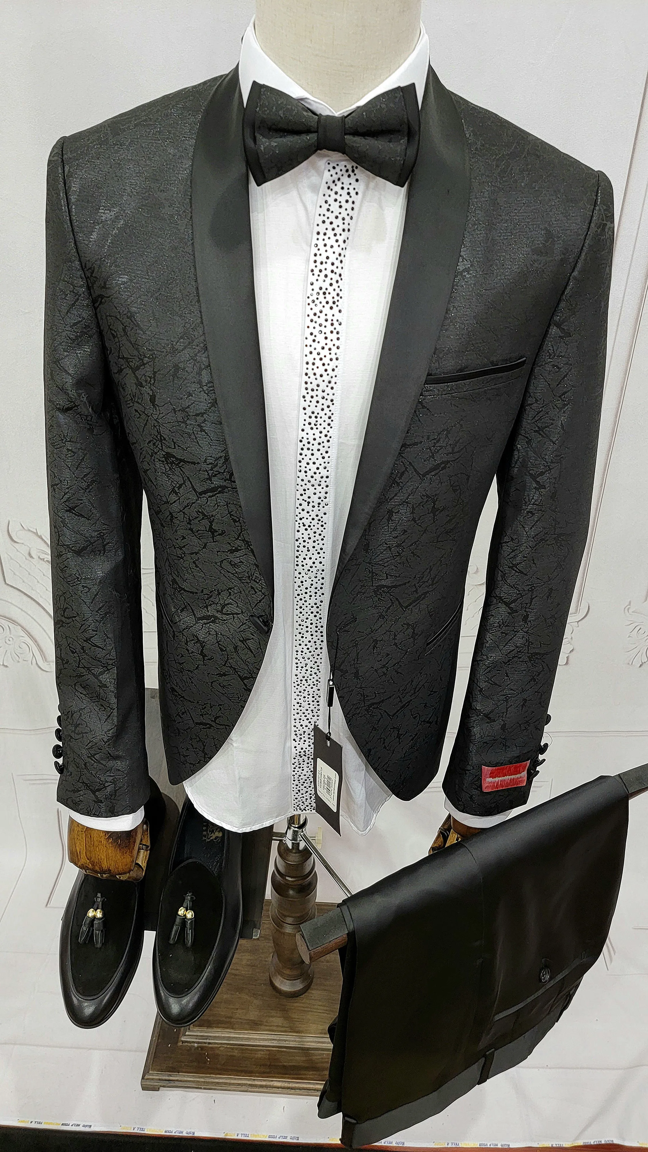 Single Button Two-Piece Tuxedo Suit with matching bow tie and Black Pants.
