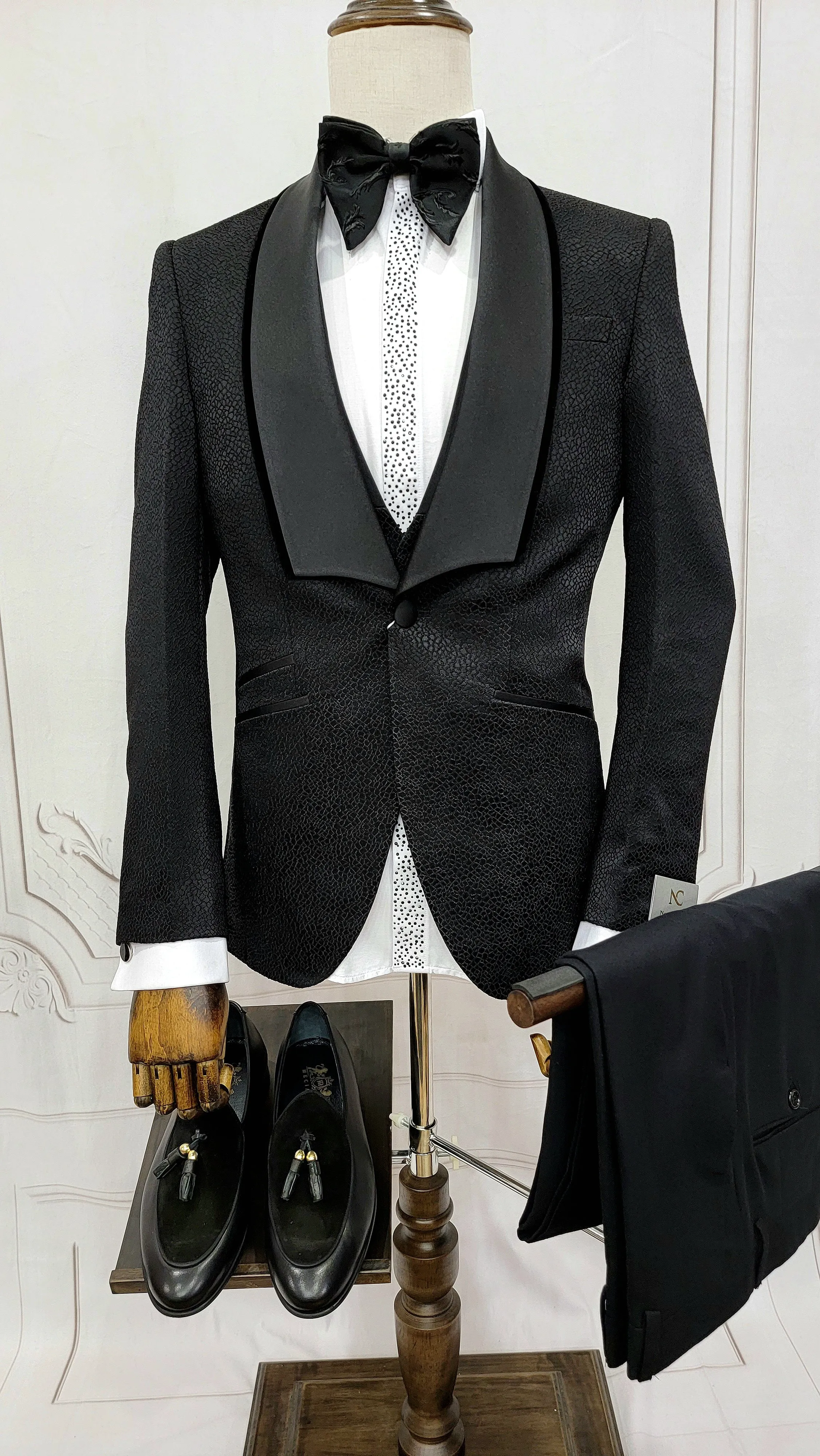 Three Piece Tuxedo Suit with Black velvet accented Lapel and Pants.