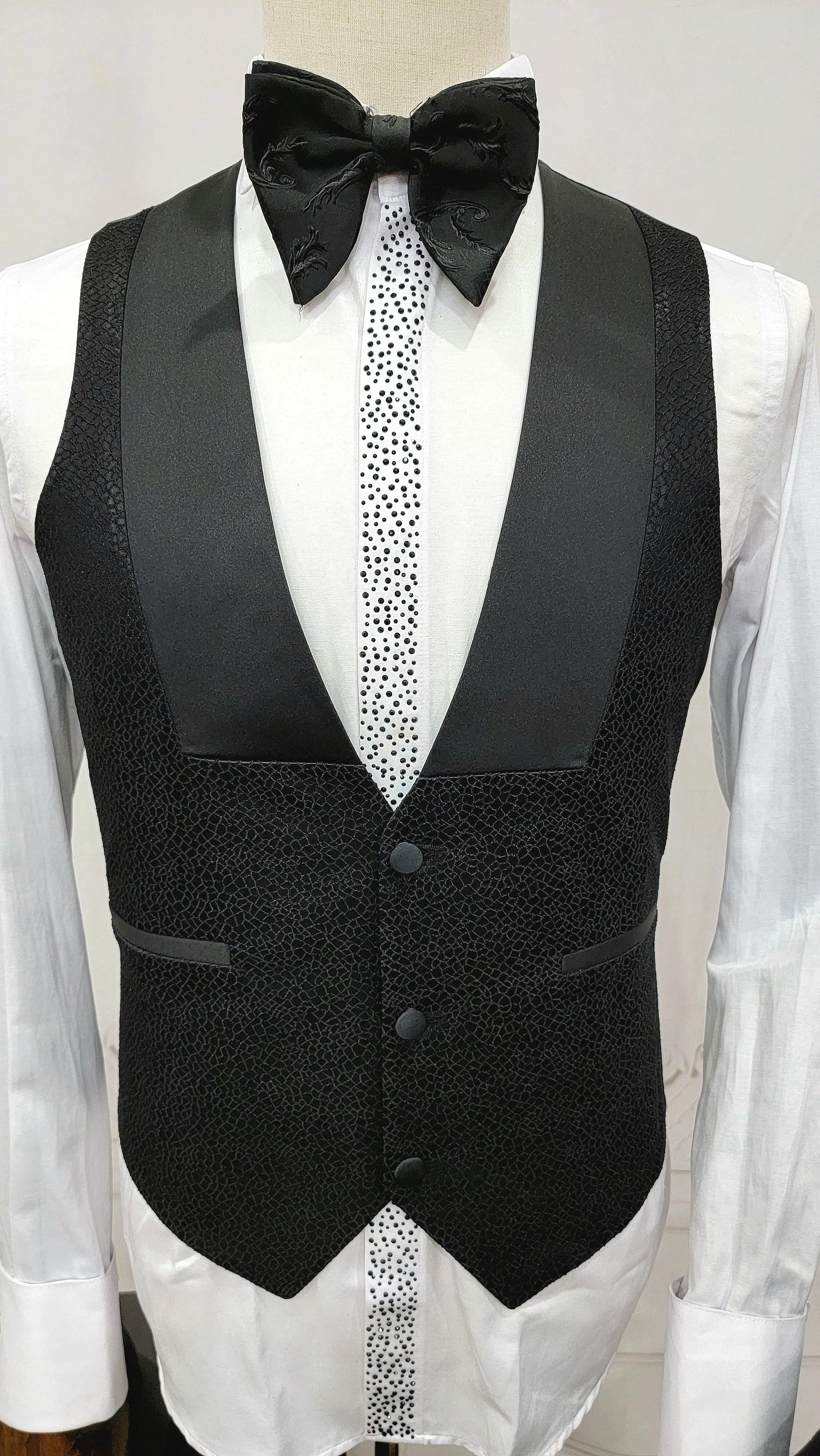 Three Piece Tuxedo Suit with Black velvet accented Lapel and Pants.