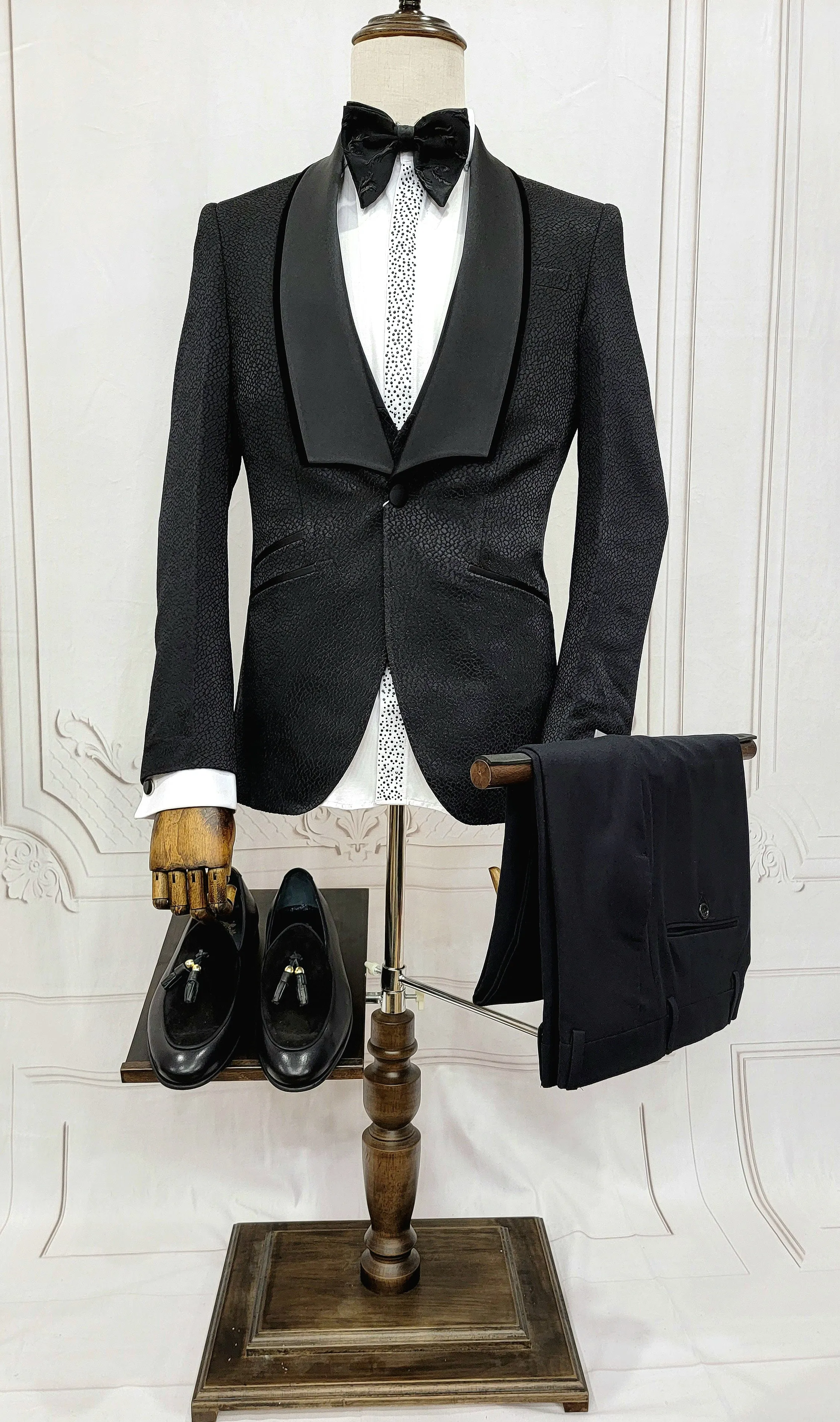 Three Piece Tuxedo Suit with Black velvet accented Lapel and Pants.