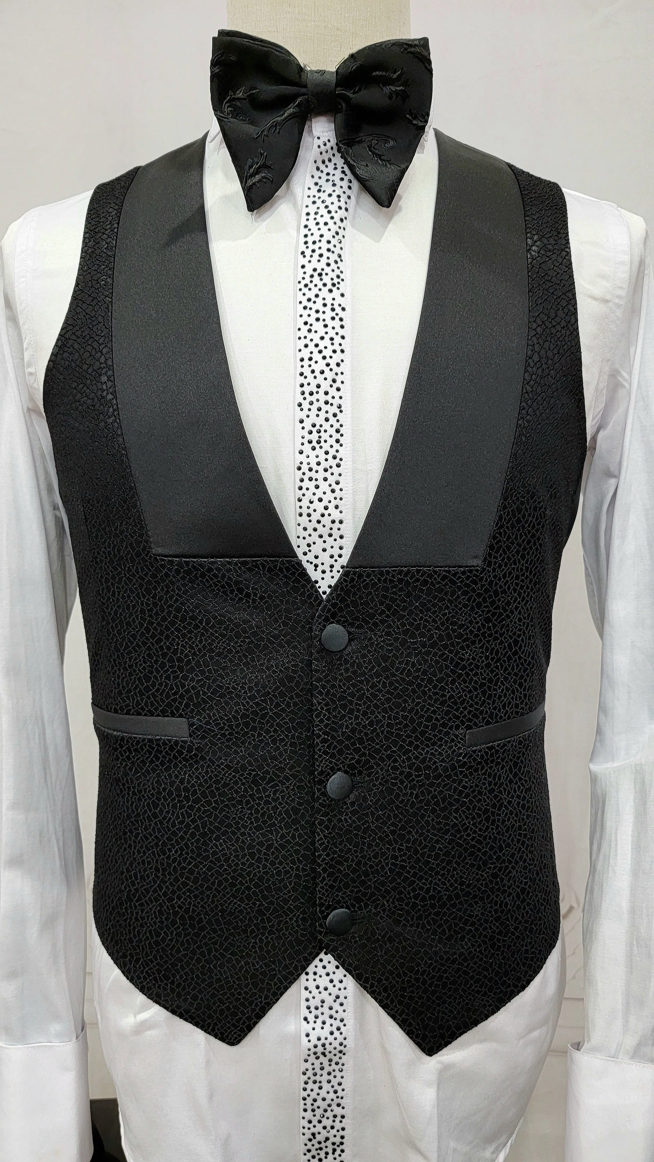 Three Piece Tuxedo Suit with Black velvet accented Lapel and Pants.